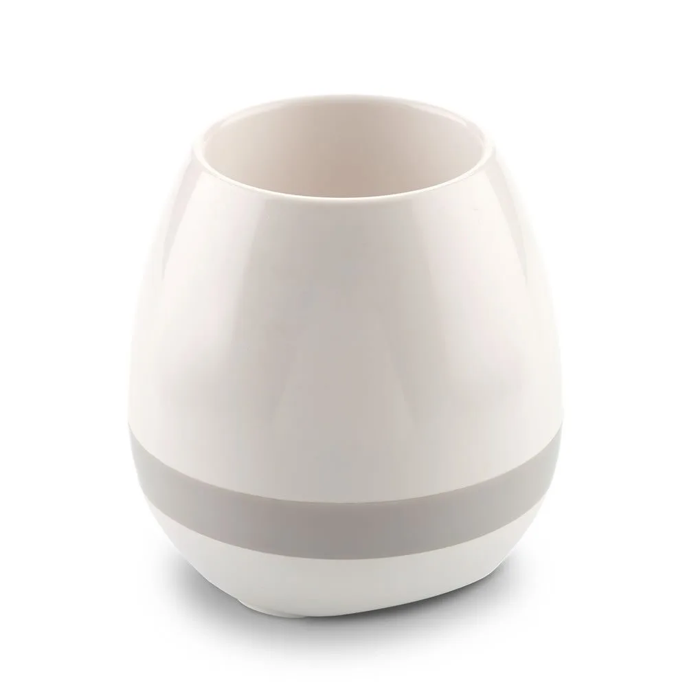 Speaker Bluetooth Plant con planta en escritorio moderno